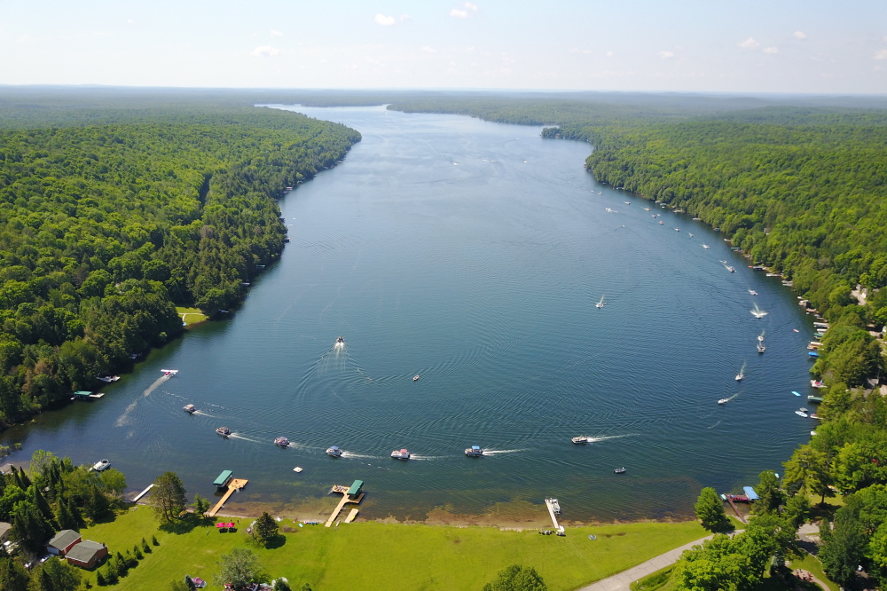 The lake water temperature hit 80°F late last week before pulling back a bit. A few years back, we recorded a temperature of 84°F in late July. If the heat holds, we could beat that this year. If you dive down past 10 feet or so, you hit a layer of lake that's not so warm. Think 70°F. If you go down past 25 or 30 feet, you hit the thermocline. Think 50°F (brr).  The lake level fell a half an inch during June, but is still just 2 inches under the record high recorded on May 1st. Historically, the level should decline around 6 inches until ice-in. If it does, that'll take some of the pressure off the shoreline. If it doesn't, when Lakes Lucerne, Metonga, and Schaefer merge, next year's boat parade will be huge.<br><br>-Nemo's not getting out until September.