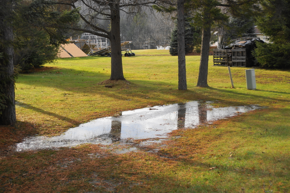 After mid-week, the lawn lagoons' ice started to breakup and there was talk of launching boats and properly pontooned mowers for one last ski run or grass cut. By the weekend it was iced tight again, boats remained winterized,  mowers parked.