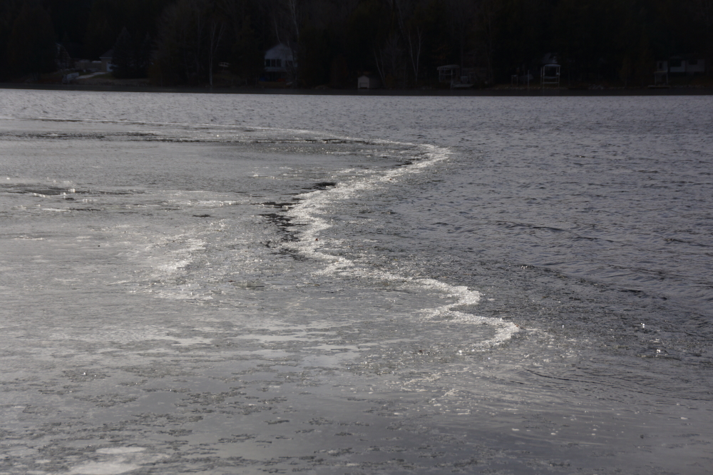 The line that separated the open water from ice-in pushed back and forth Saturday and Sunday making a noise not unlike a glass wind chime.