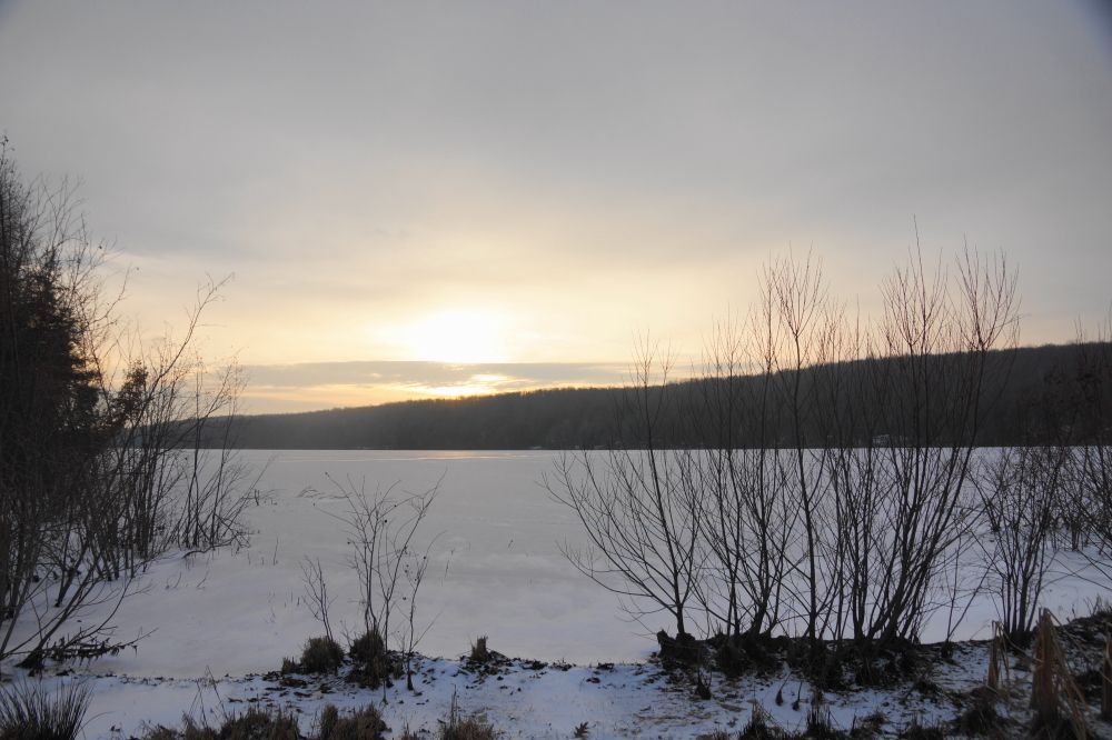 In the days that followed, wind blew the meager amount of snow over the newly frozen North end and the ice lost its clearness.
