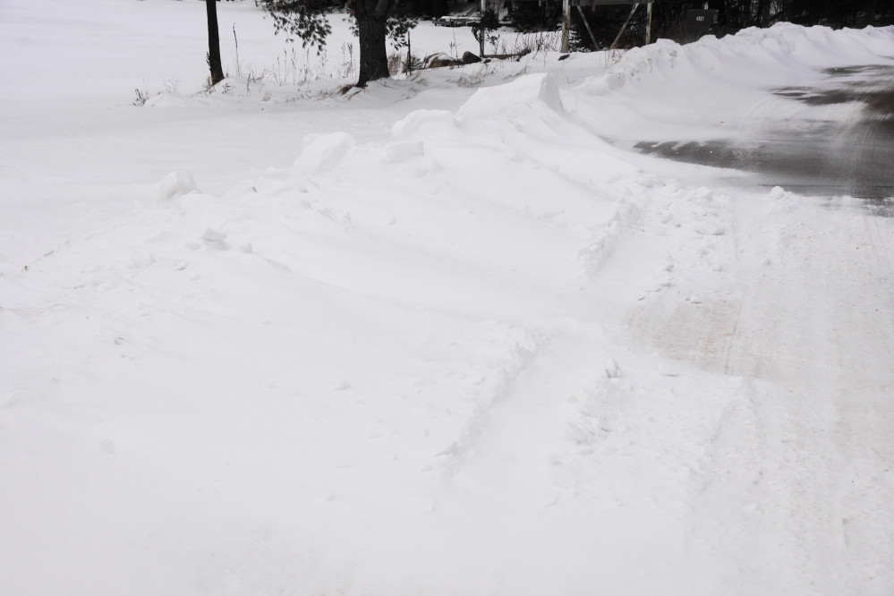 With the cold came some light snow and some not so light wind. Given that the wind only had about an inch of snow to work with, the resulting drifts were impressive.