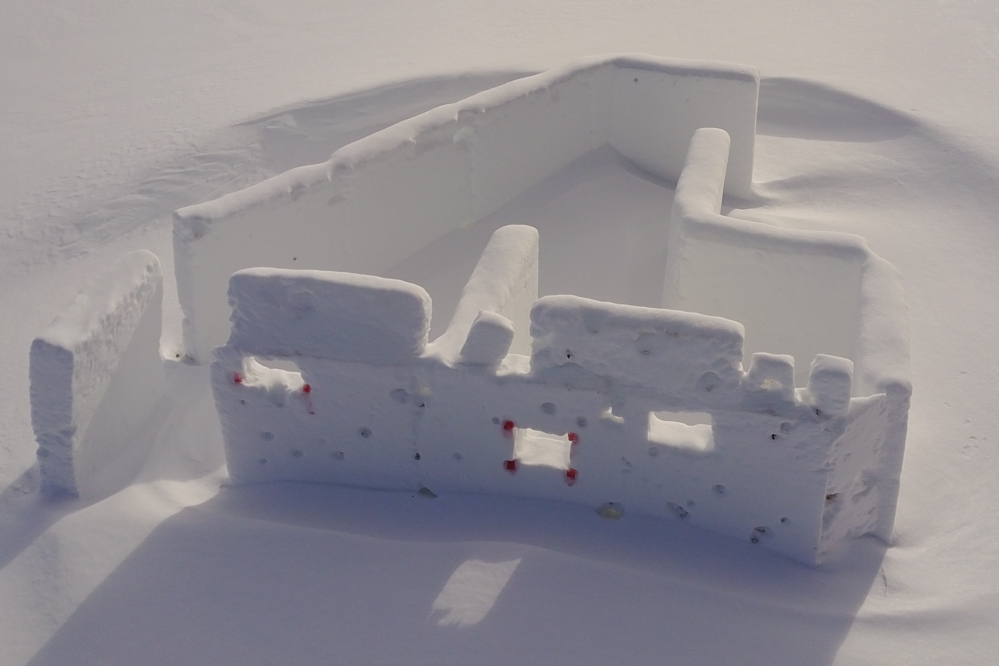 The few days that went above freezing combined with the brutally cold ones to turn the fort walls from a light, Styrofoam like material to something resembling rock. Then the wind filled the south end with over 2 feet of snow.