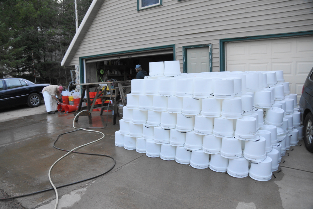 It took the men about 5 hours to wash, rinse, and stack the buckets.
