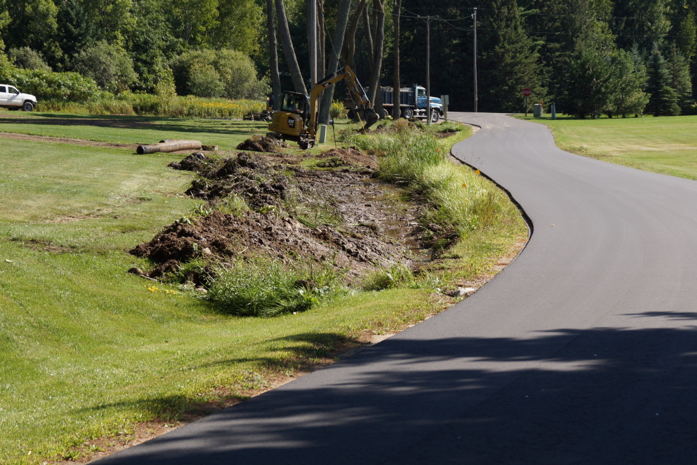 Upper and lower Lake Walerko were dredged this week in an effort to return them to their natural state as a lawn.
