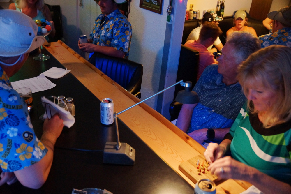 At the end of the evening, some up and comers were showing bar rail bowling skills that could threaten the elite of the sport.  The hungry athletes left empty glasses and an exhausted pin monkey in their wake, while showing a healthy disdain for range balls.  An unprecedented touching of "The Golden Pin" occurred more than once!