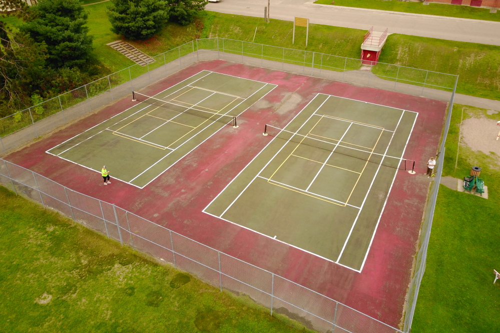 Back in Crandon, the nets are still up on the courts at Cardinal Park. Aside from some pickle ball related graffiti, the playing surface is in good shape.