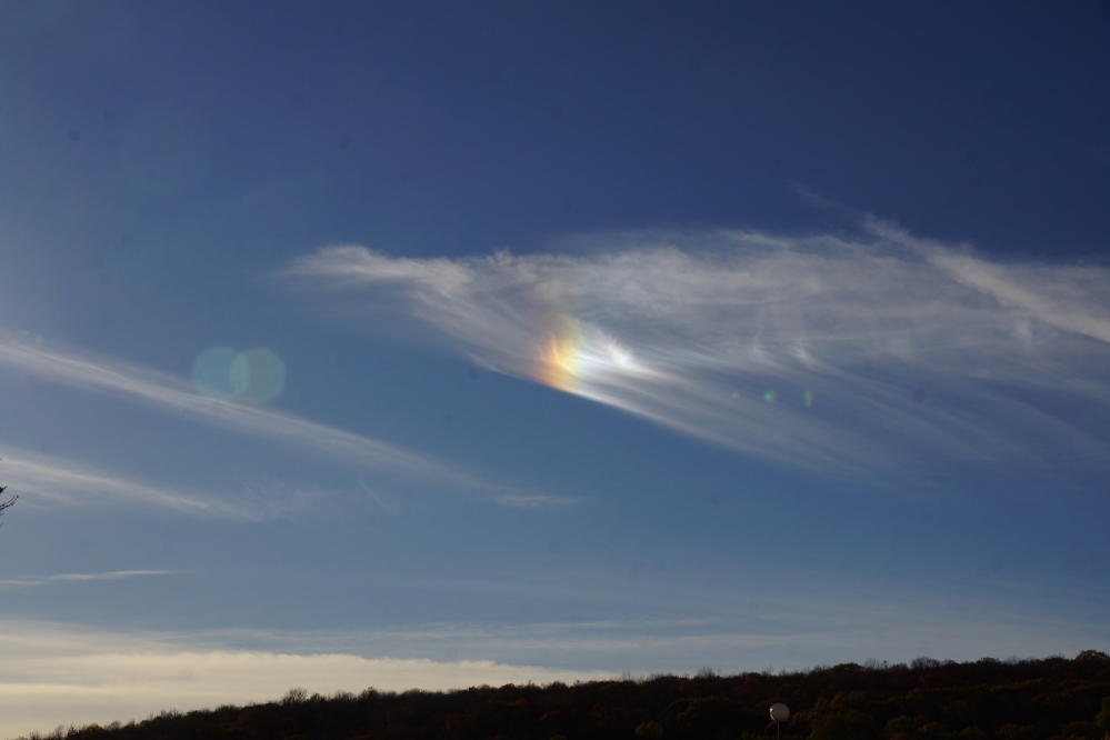 In the spaces between the rain, we got some sun. Early in the week the lake saw one of the better sun dogs of the year.