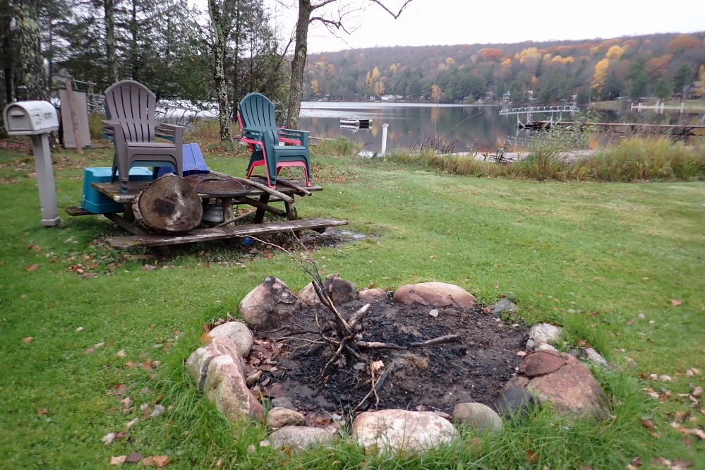 The weather pushed any end of season mowing or campfires (the fire danger is currently low!) into next week. The flatness of the lake made getting some of the remaining stuff out out the water a little easier.