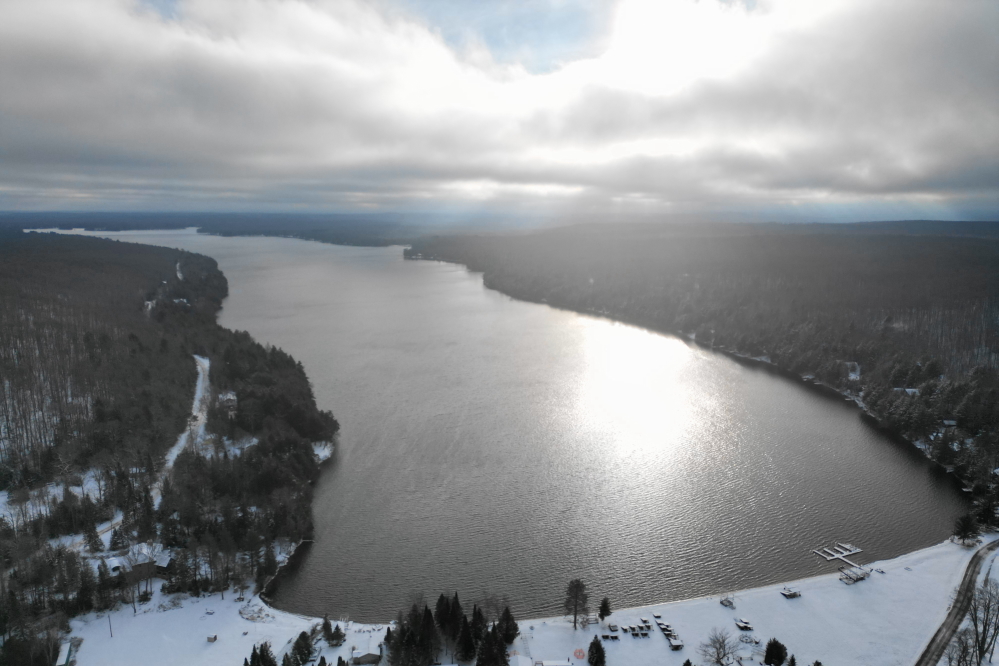 Last week, the lake started off open. Lucerne ended the week mostly open. If we would have gotten one cold, still night near the weekend it might have iced-in. We didn't and the ice-in contest goes on.