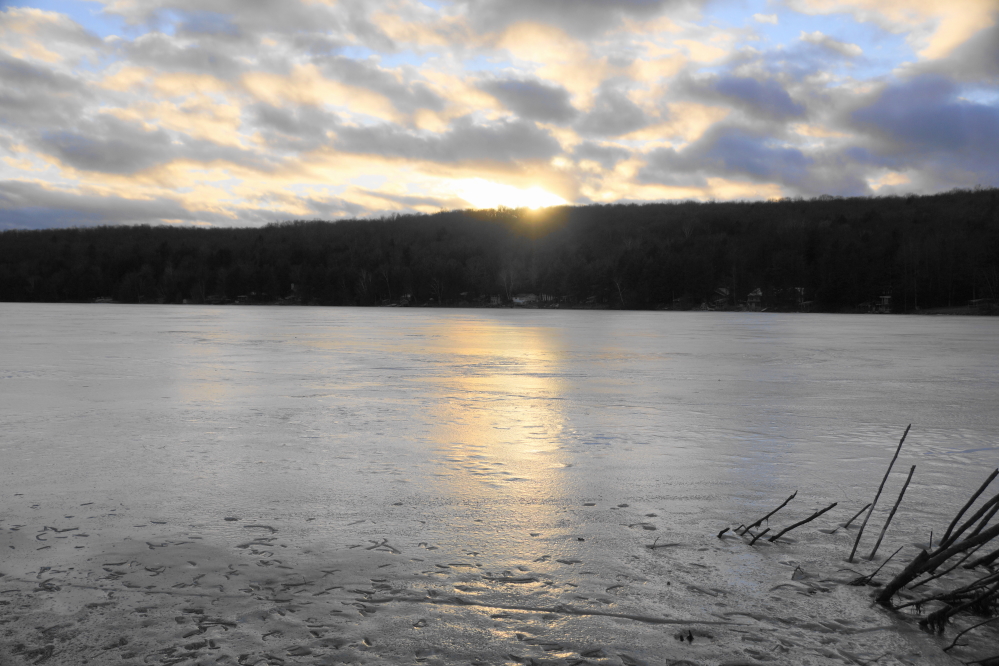 There aren't more than a few days a season where you get a sunset reflected off the lake ice. This year we've seen more than our share.