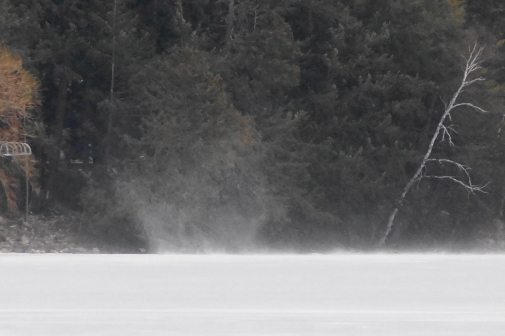 Sunday's strong wind had snow devils dancing up and down the lake.