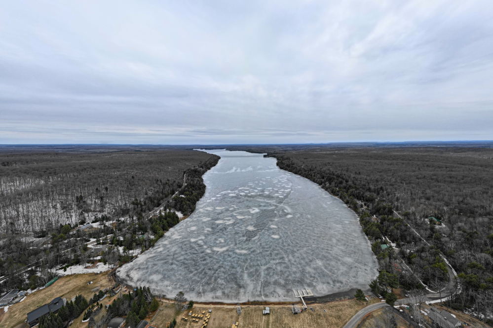 At the start of last week, there was ice on the lake.  We did not think that the ice would last through the weekend. Then the ouija board operators that forecast the weather around these parts suddenly dropped forecasted temperatures by 5°F to 10°F.  At the end of the week, there were tales of late winter weather and only a little less ice.