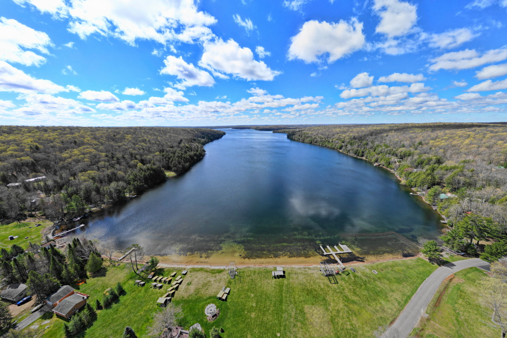 Put away your downhill skis, winter coats, and hats. The calendar has crossed the <a href='/WeeklySummaryPages/2014/0512/RollerCoasterSpringN.html' class ='defaultlink2' target='_blank'>snow/no snow</a> line. It can be safely assumed, or at least hoped, that we will not get any more snow for a few months. Because swimming/skiing/diving in 52°F water is un-fun, between lawn mowings and a 62°F lake, now is the best time to stock up on Bactine, Ibuprofen, and energy drinks. Given the early season bugginess, it might be a good idea to grab some Benadryl, too.<br><br><br>-Nemo vows this summer will have more skiing and bar nights, less down time.