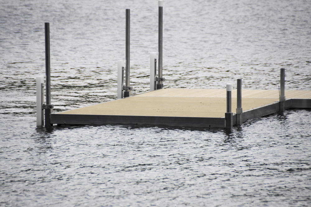 The rising lake has given some pier owners heartburn and, when the waves are up, wet feet.