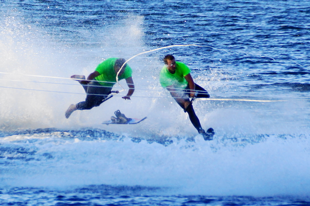 Due to the road trip, we missed Wednesday's water ski show. This is the first show I've missed in 10 years. Coincidentally, I took one of my personal favorite pictures of the show ten years ago. That's year round resident,  EMT, and current LLAA board member on the left. I'm not sure who one ski guy was.