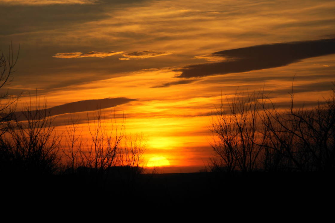 With nothing helpful open in Iowa until Monday we ate Taco John food and saw a few indigestion filled sunsets.