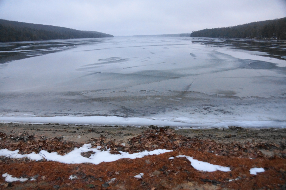 Last week started off warm-ish. There was peeking grass, fog, and snow melt puddles that dominated the lakescape. That would change.
