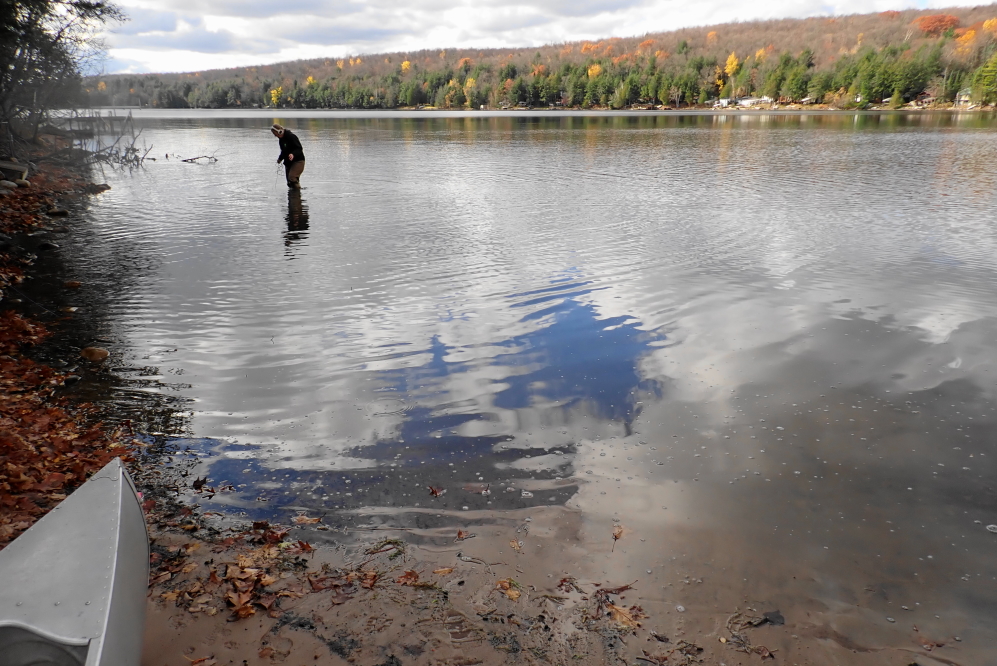With the lake level falling fast, there was talk among the men of leaving some sections in with the hope the lake would retreat from under them (lazy men). Ultimately, they ended up pulling in every part.