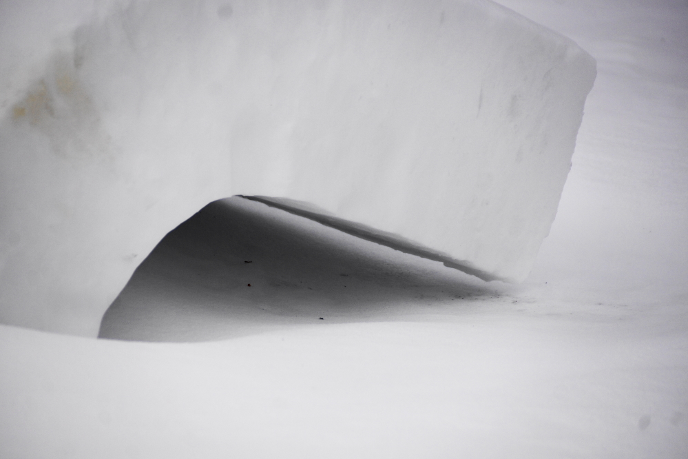 The top of the bendy wall will touch the ground in just about half an inch.