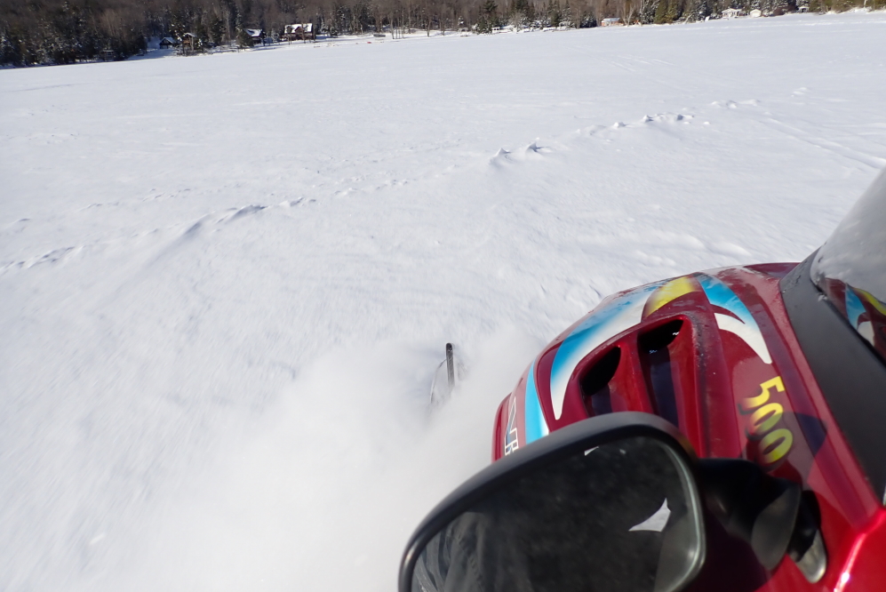 Before Friday, the snow on the lake was deepish, soft, and fluffy. Sledding was like riding on a cloud.