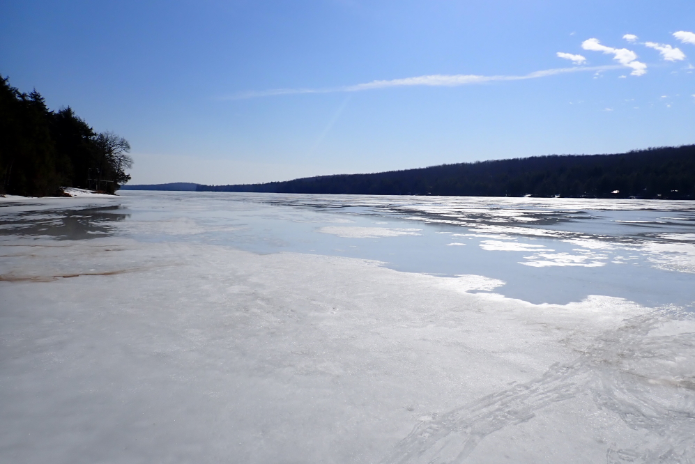 The second last task of the week was to squish out onto the be-puddled lake and check the ice.