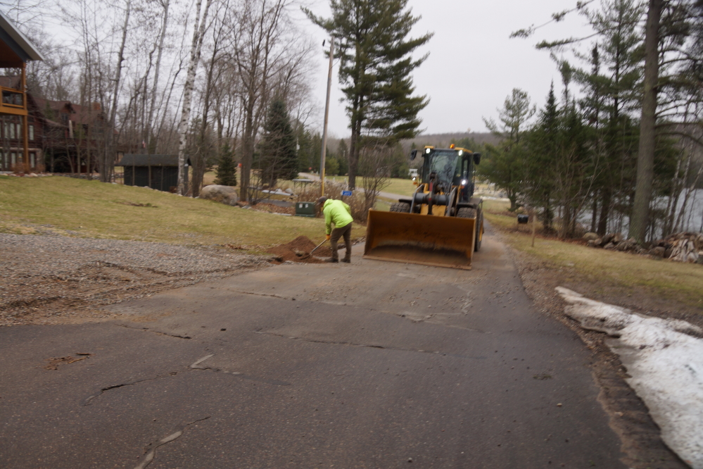 A day later the new river dried up and the highway department was dispatched to fill erosion trenches and amazingly straighten mailboxes.