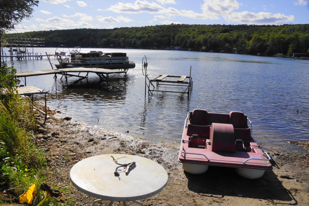 It's that time of year when lifts, boats, and piers are pulled from the increasingly cool water. Some people pulled it all out in a day. Others got distracted or bored and wandered off halfway through.